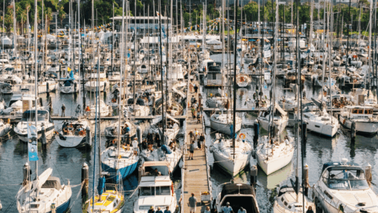 An aerial view of Royal Geelong Yacht Club's main marina at Festival of Sails, full of spectators and boats.
