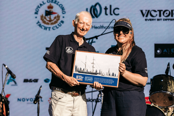 2026 Festival of Sails Chair with Sunset Media Sailor Girl Nic Douglass. On the stage at the 2026 final presentations.